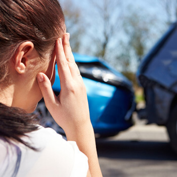 Distraught Woman After Car Accident